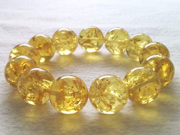 Amber bracelets_ color is lemon with sparkle bubbles inside